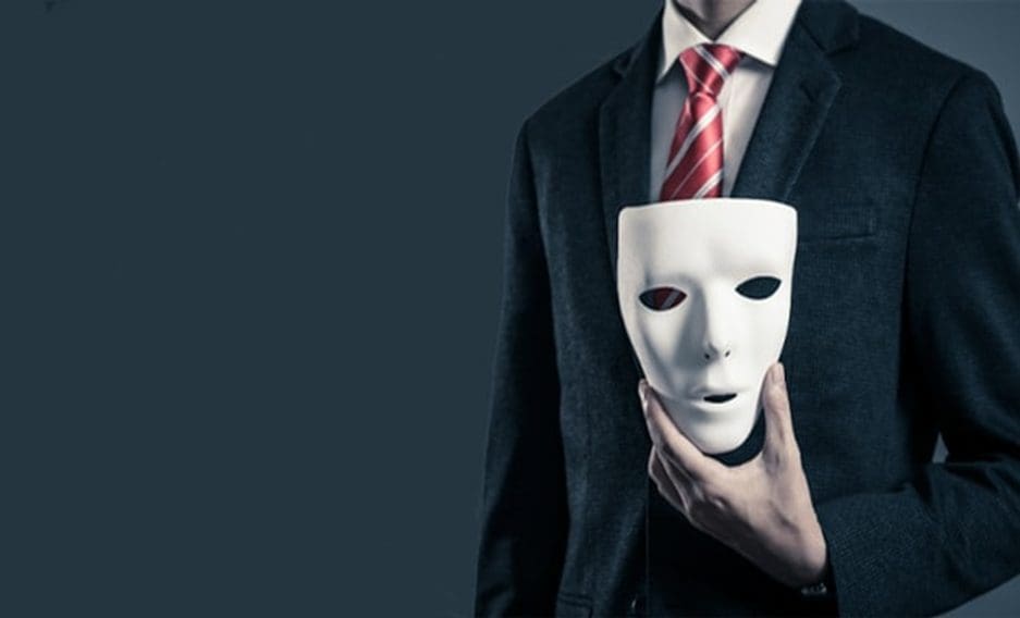 Man holding mask. Prevent Financial Fraud. Runey & Associates Wealth Management. Mount Pleasant, SC.